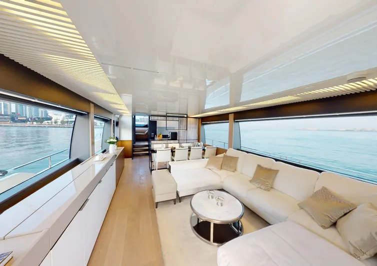  Yacht Photos Pics Luxurious interior of 2019 Ferretti Yachts 780 with elegant seating and panoramic windows.