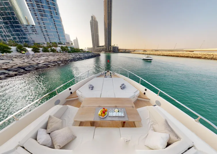  Yacht Photos Pics Luxurious 2019 Ferretti Yachts 780 cruising in a scenic urban waterway.