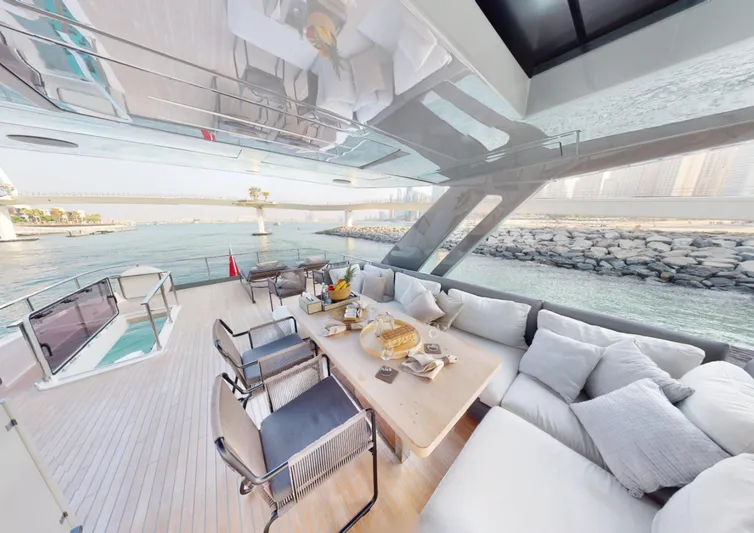  Yacht Photos Pics Luxurious 2019 Ferretti Yachts 780 deck with elegant seating and ocean view.