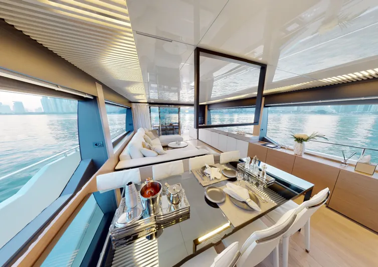  Yacht Photos Pics Luxurious interior of 2019 Ferretti Yachts 780 with elegant dining area and panoramic windows.
