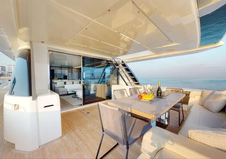  Yacht Photos Pics Luxurious 2019 Ferretti Yachts 780 with elegant outdoor dining area and ocean view.