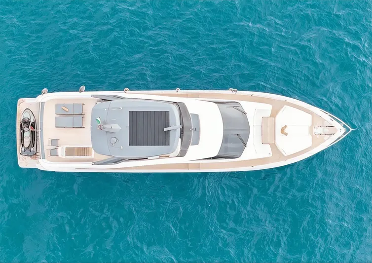  Yacht Photos Pics Aerial view of 2019 Ferretti Yachts 780 on clear blue water.