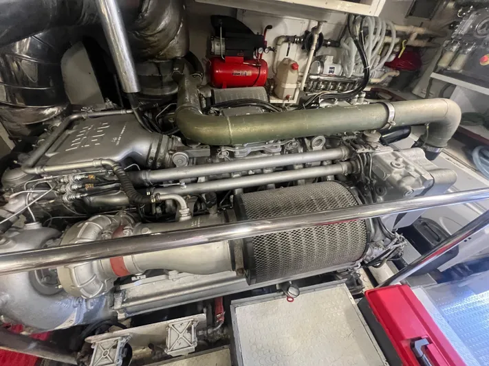 Dubai Yacht Photos Pics Engine room of a 2003 Maiora 24 S yacht, showcasing complex machinery and components.