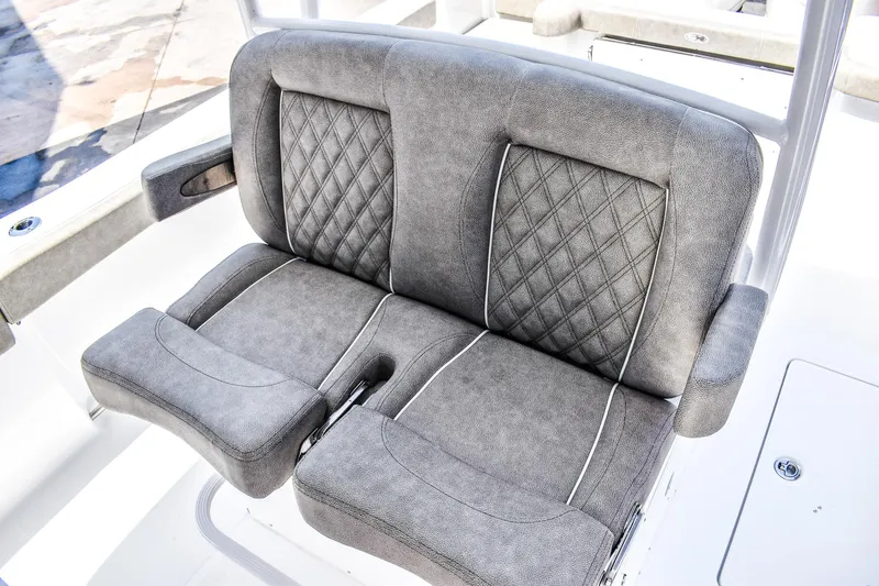  Yacht Photos Pics 2025 Sea Hunt Gamefish 30 boat seating with gray upholstery and diamond stitching.