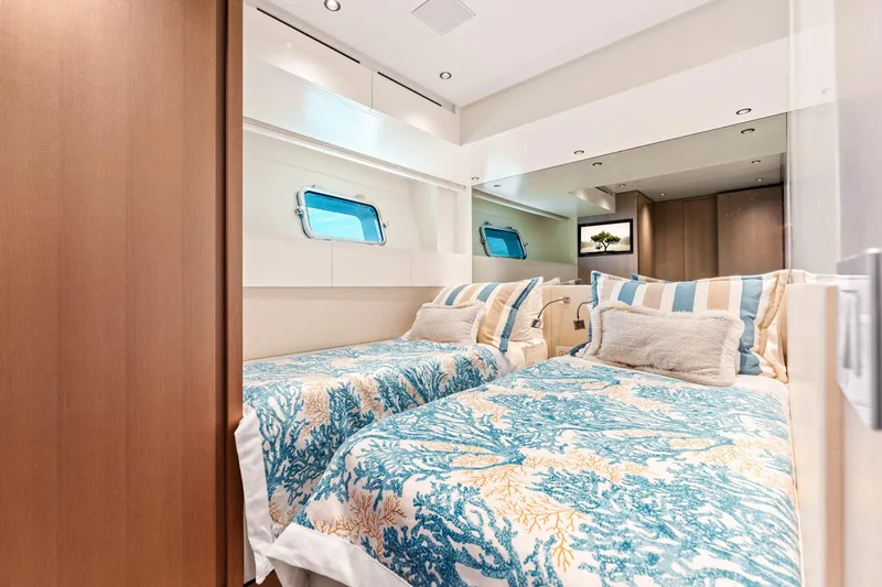 North Yacht Photos Pics Luxurious Sanlorenzo SX88 2020 yacht bedroom with twin beds and elegant decor.