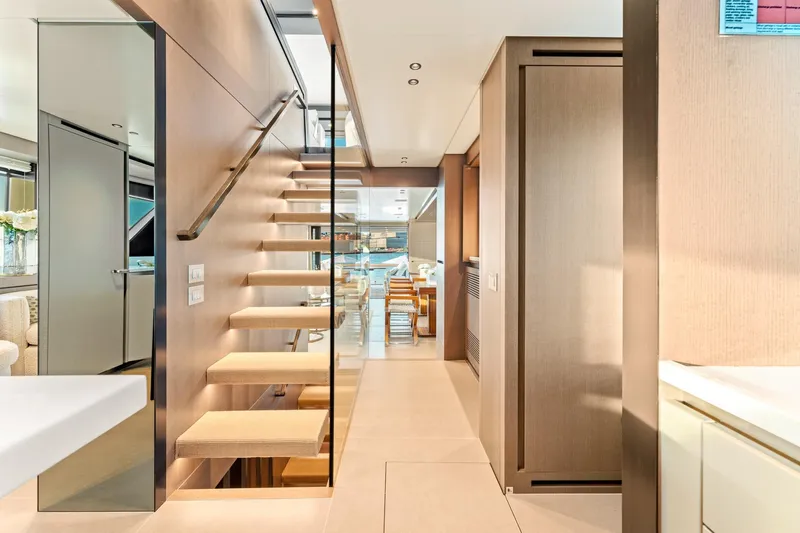North Yacht Photos Pics Modern interior of 2020 Sanlorenzo SX88 yacht with sleek staircase and elegant design.