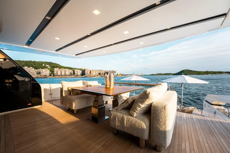 North Yacht Photos Pics Luxurious 2020 Sanlorenzo SX88 yacht deck with elegant seating and ocean view.
