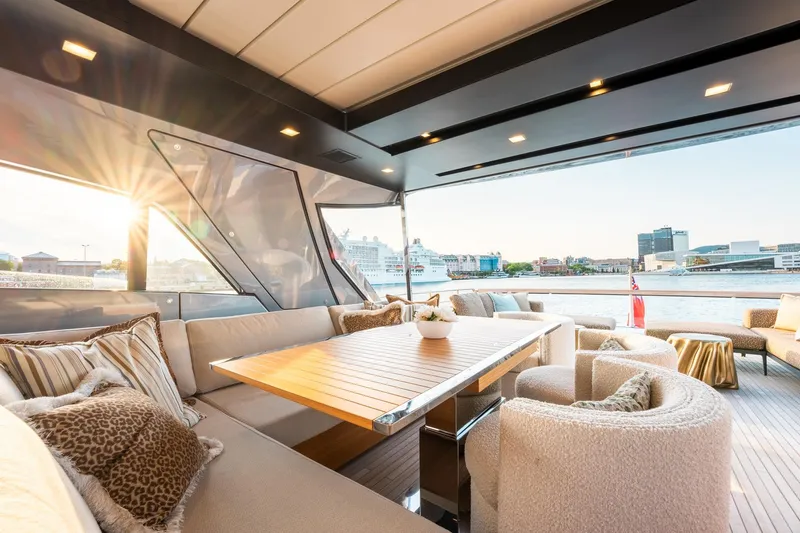 North Yacht Photos Pics Luxurious Sanlorenzo SX88 yacht interior with elegant seating and waterfront view, 2020 model.