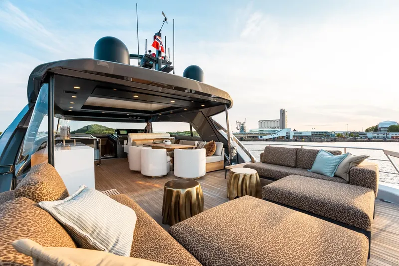 North Yacht Photos Pics Luxurious 2020 Sanlorenzo SX88 yacht deck with elegant seating and waterfront view.