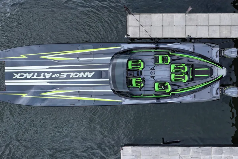 Aoa Marine C4000 Yacht Photos Pics Aerial view of 2025 Mystic Powerboats C4000, docked, with sleek design and vibrant green accents.