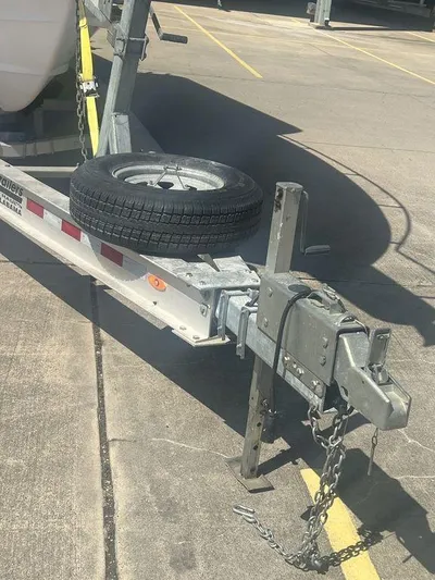  Yacht Photos Pics Trailer hitch and spare tire for 2003 Grady-White 306 Bimini boat.