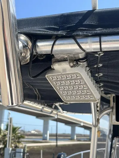  Yacht Photos Pics LED light fixture on a 2003 Grady-White 306 Bimini boat, under a metal frame.