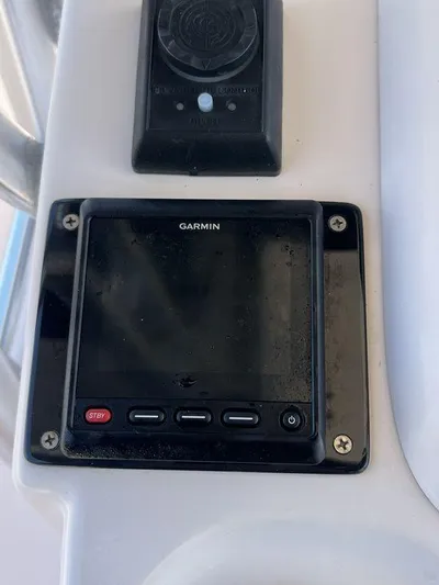  Yacht Photos Pics Garmin marine device on 2003 Grady-White 306 Bimini boat dashboard.