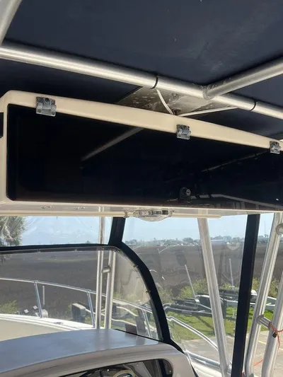  Yacht Photos Pics 2003 Grady-White 306 Bimini boat interior with overhead storage compartment.