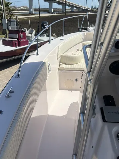  Yacht Photos Pics 2003 Grady-White 306 Bimini boat interior with cushioned seating and railing.