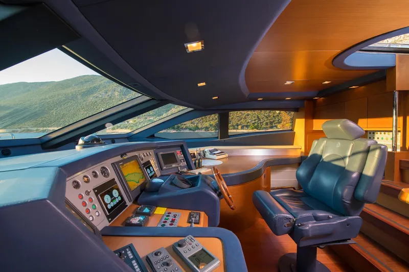 La Rubia Yacht Photos Pics Luxurious 2011 Azimut La Rubia yacht cockpit with modern navigation controls and plush seating.