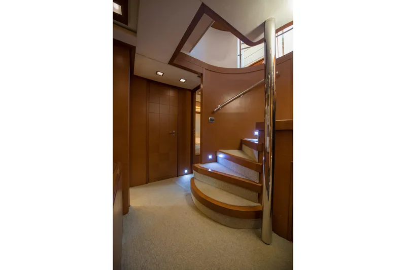 La Rubia Yacht Photos Pics Luxurious wooden staircase interior on 2011 Azimut La Rubia yacht.
