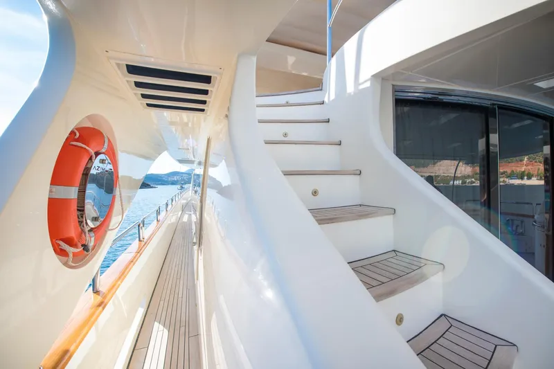 La Rubia Yacht Photos Pics Luxurious 2011 Azimut La Rubia yacht deck with stairs and lifebuoy.