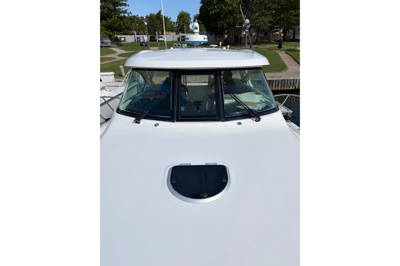 Loophole Yacht Photos Pics 2013 Tiara Yachts 3600 Coronet boat docked, front view with windshield and hatch.