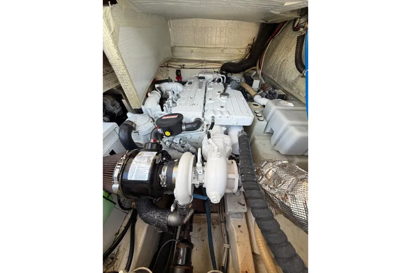 Loophole Yacht Photos Pics Engine compartment of 2013 Tiara Yachts 3600 Coronet, showcasing detailed mechanical components.