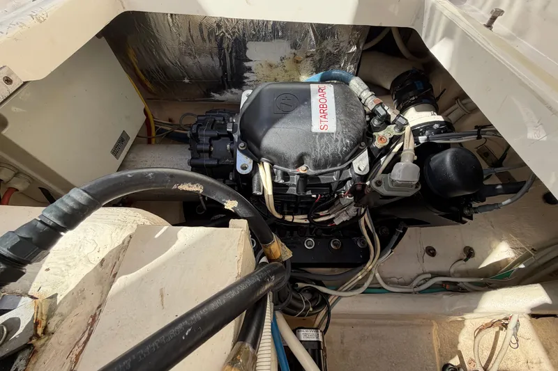 Loophole Yacht Photos Pics Engine compartment of a 2013 Tiara Yachts 3600 Coronet, showing detailed mechanical components.