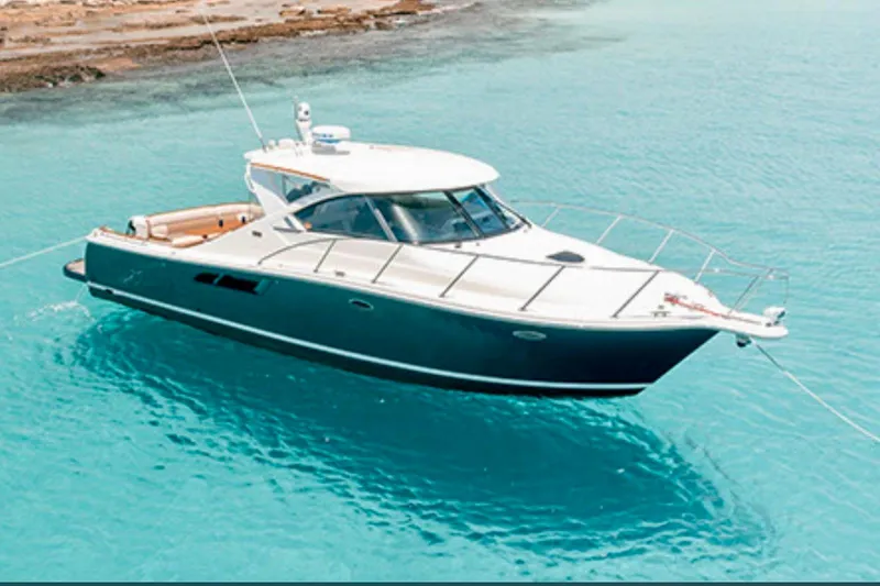 Loophole Yacht Photos Pics 2013 Tiara Yachts 3600 Coronet in clear turquoise waters.