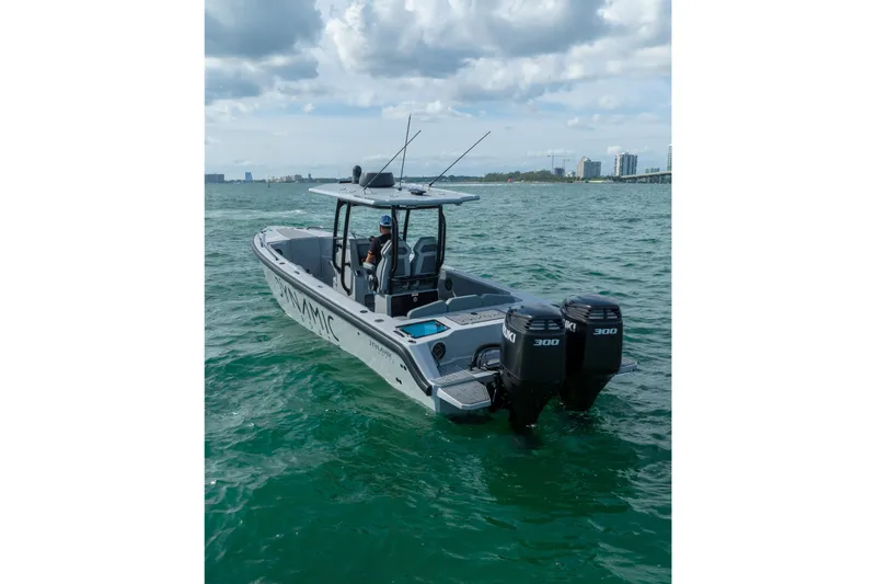  Yacht Photos Pics 2024 Dynamic D-305V boat with dual engines on open water.