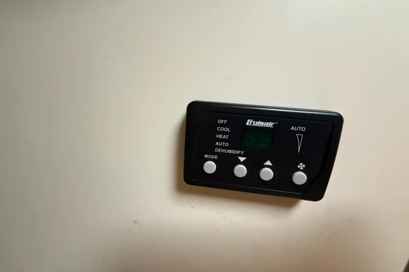  Yacht Photos Pics Control panel on a 2011 Boston Whaler 285 Conquest boat interior.