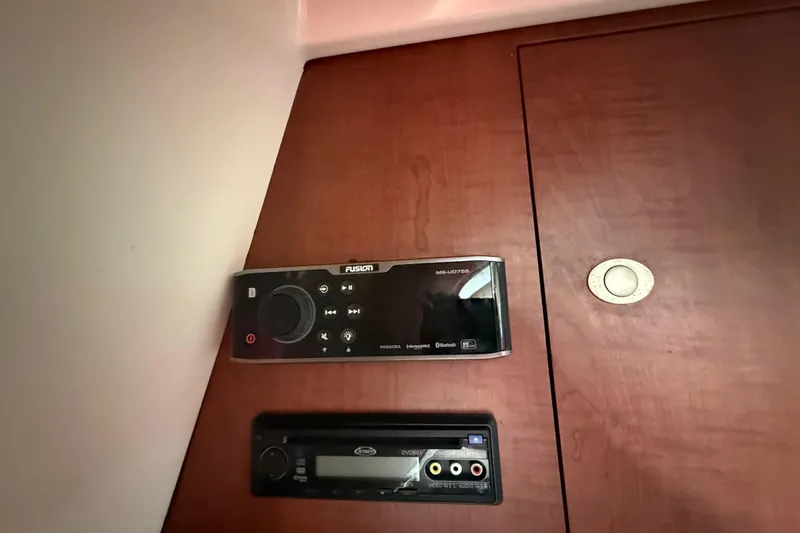  Yacht Photos Pics Audio system controls on 2011 Boston Whaler 285 Conquest boat interior.