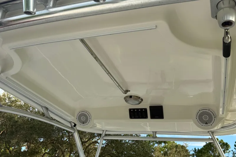  Yacht Photos Pics 2011 Boston Whaler 285 Conquest boat interior ceiling with speakers and lighting.