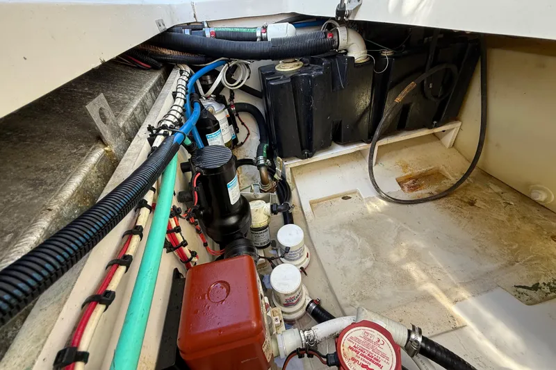  Yacht Photos Pics 2011 Boston Whaler 285 Conquest engine compartment with wiring and components.