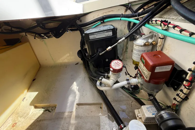  Yacht Photos Pics Engine compartment of 2011 Boston Whaler 285 Conquest with visible wiring and components.