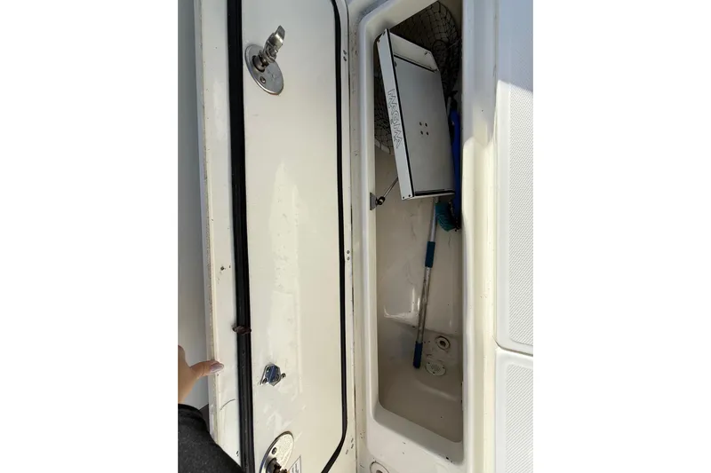  Yacht Photos Pics Open storage compartment on a 2011 Boston Whaler 285 Conquest boat.