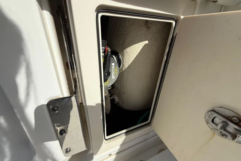  Yacht Photos Pics Open storage compartment on a 2011 Boston Whaler 285 Conquest boat.