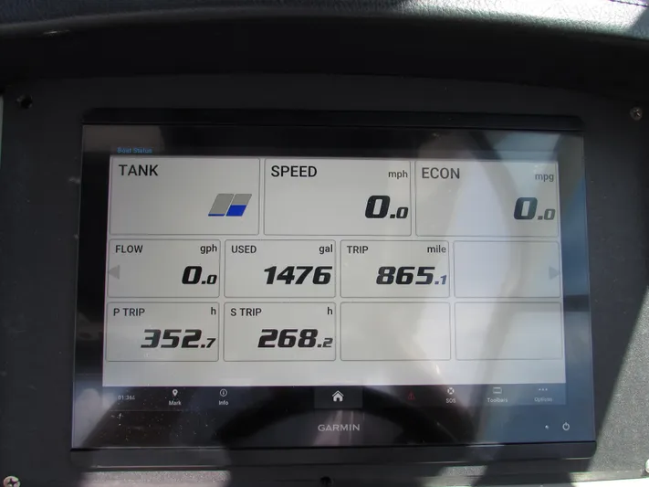 317-147 Ray Brokerage Yacht Photos Pics Garmin display on 2017 Robalo 317 boat showing fuel and trip data.