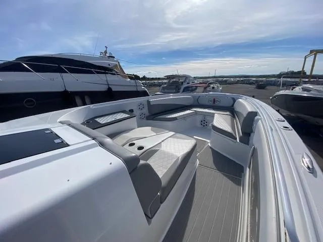 Cigarette 42 Yacht Photos Pics 2017 Cigarette 42 Huntress boat with sleek seating and modern design in a marina setting.