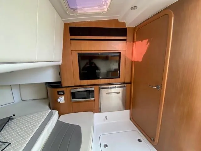 Cigarette 42 Yacht Photos Pics Interior of 2017 Cigarette 42 Huntress boat with modern amenities and wood finish.