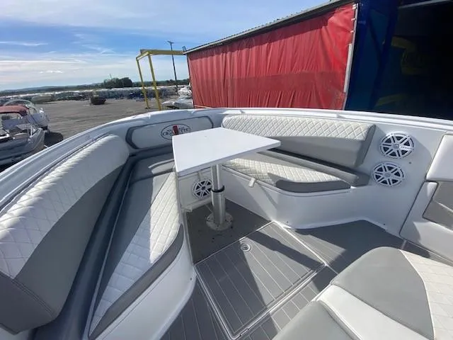 Cigarette 42 Yacht Photos Pics 2017 Cigarette 42 Huntress boat interior with white seating and table.