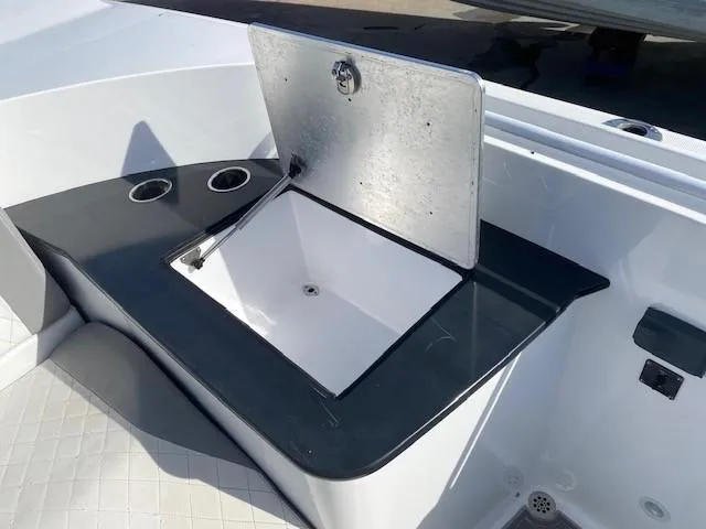 Cigarette 42 Yacht Photos Pics 2017 Cigarette 42 Huntress boat sink with open lid and cup holders.