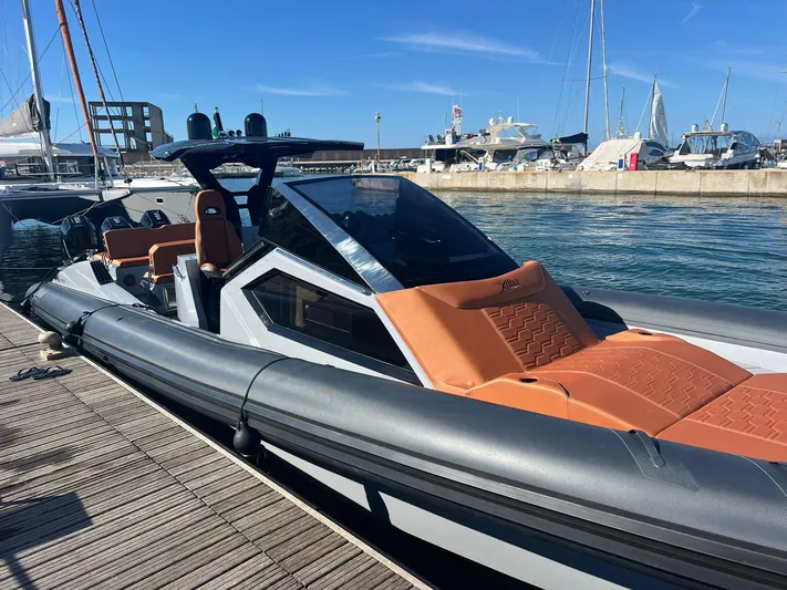  Yacht Photos Pics Luxury DNA 46 boat docked at marina, 2025 model, sleek design, and modern features.