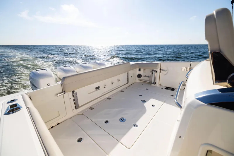 Smoke Show Yacht Photos Pics 2021 Boston Whaler 420 Outrage boat deck with ocean view and powerful engines.
