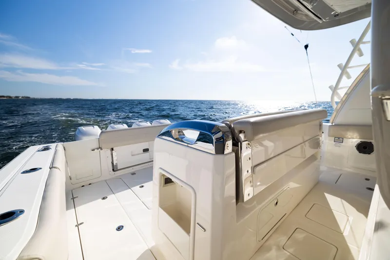 Smoke Show Yacht Photos Pics 2021 Boston Whaler 420 Outrage boat interior with ocean view, sunny day.