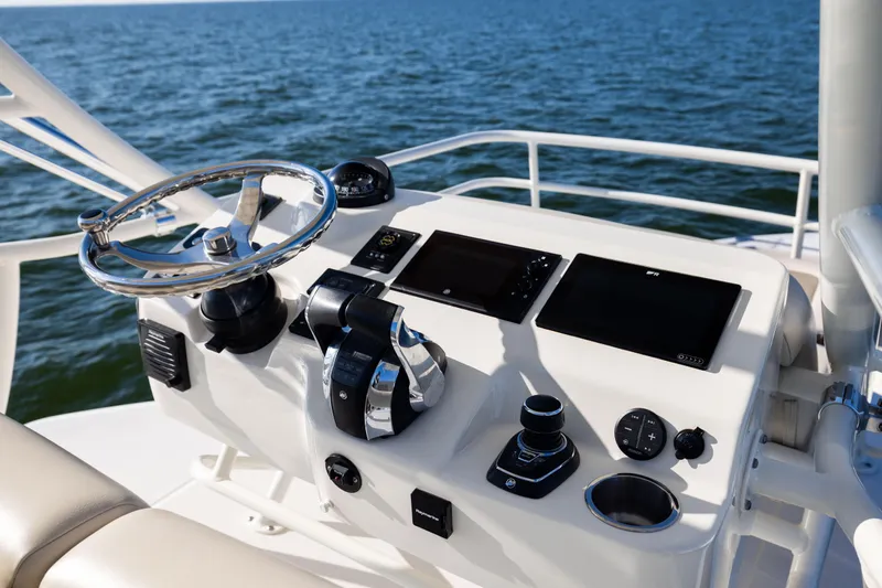 Smoke Show Yacht Photos Pics Control panel of 2021 Boston Whaler 420 Outrage boat with ocean view.