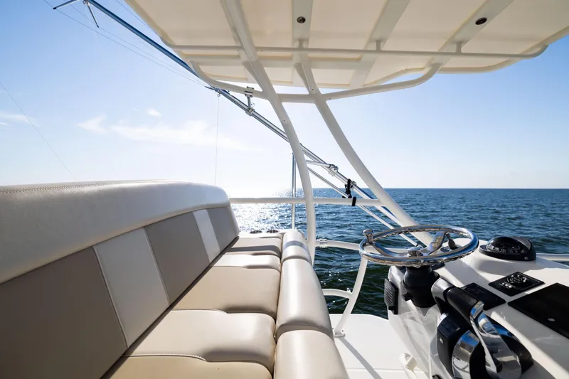 Smoke Show Yacht Photos Pics 2021 Boston Whaler 420 Outrage helm and seating with ocean view.