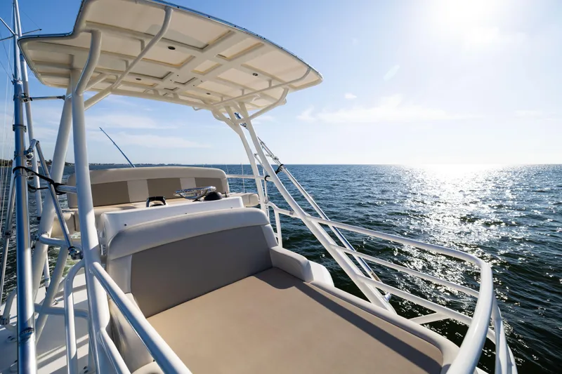 Smoke Show Yacht Photos Pics 2021 Boston Whaler 420 Outrage boat on open sea under clear sky.