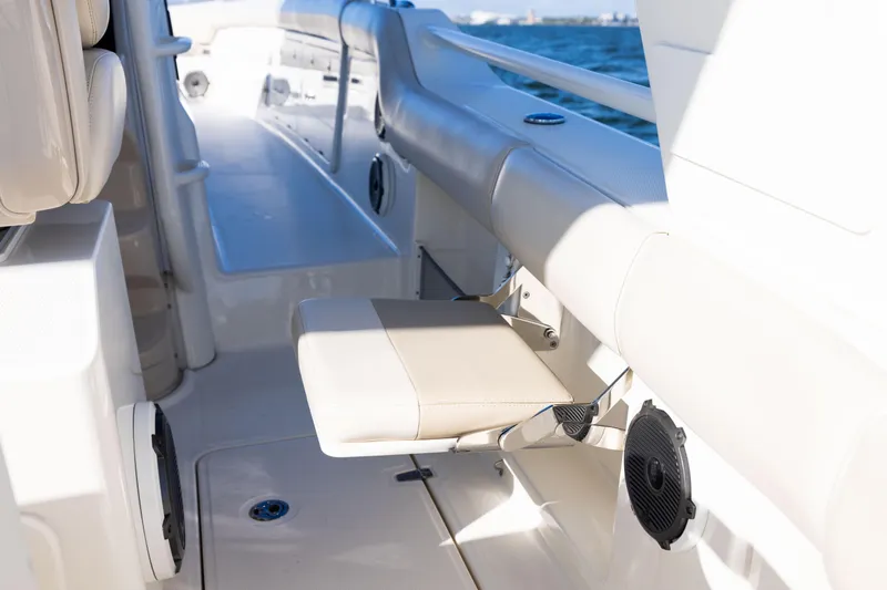 Smoke Show Yacht Photos Pics 2021 Boston Whaler 420 Outrage interior with seating and speaker detail.
