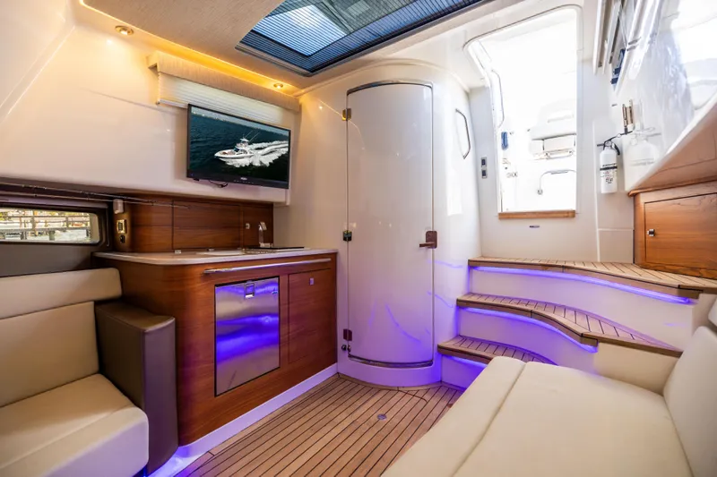 Smoke Show Yacht Photos Pics Luxurious interior of 2021 Boston Whaler 420 Outrage with modern amenities and elegant design.