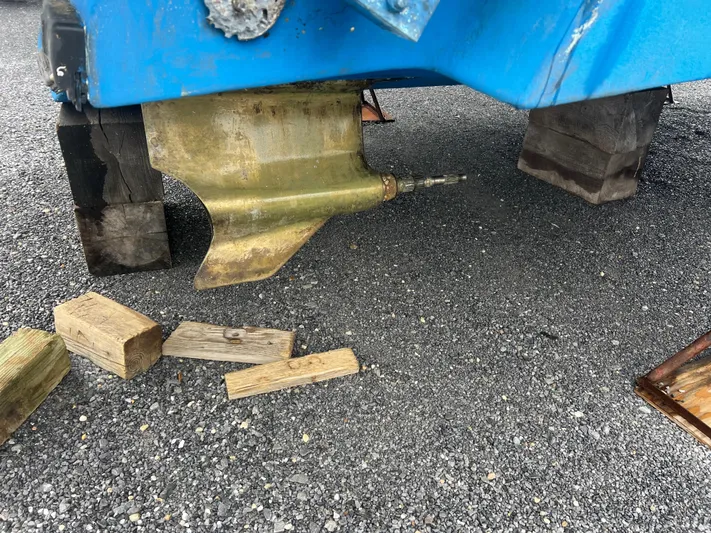 Royal Zenith Yacht Photos Pics 2013 Formula 45 Yacht underbody with propeller shaft, supported by wooden blocks.