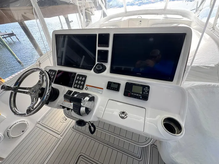  Yacht Photos Pics 2020 Intrepid 407 Cuddy helm with dual screens and modern controls.