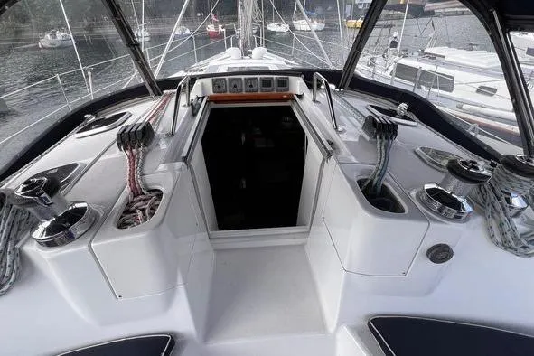  Yacht Photos Pics Cockpit of 1999 Hunter 410 sailboat with ropes and winches, docked in marina.